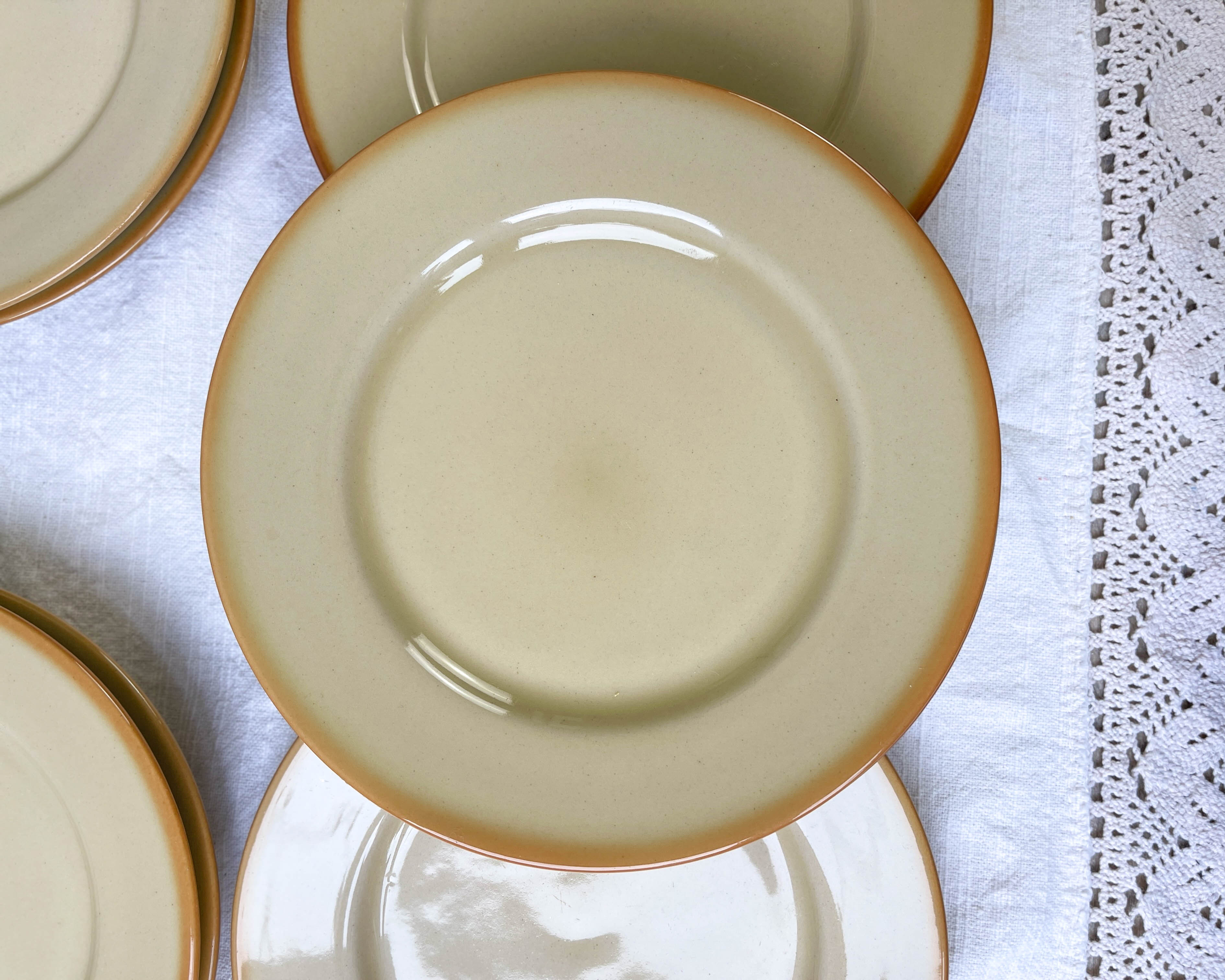 9 mid-century beige Tulowice stoneware plates