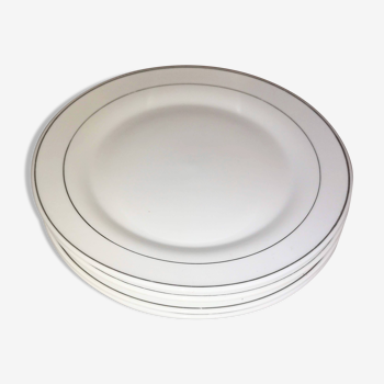 Four white porcelain dessert plates