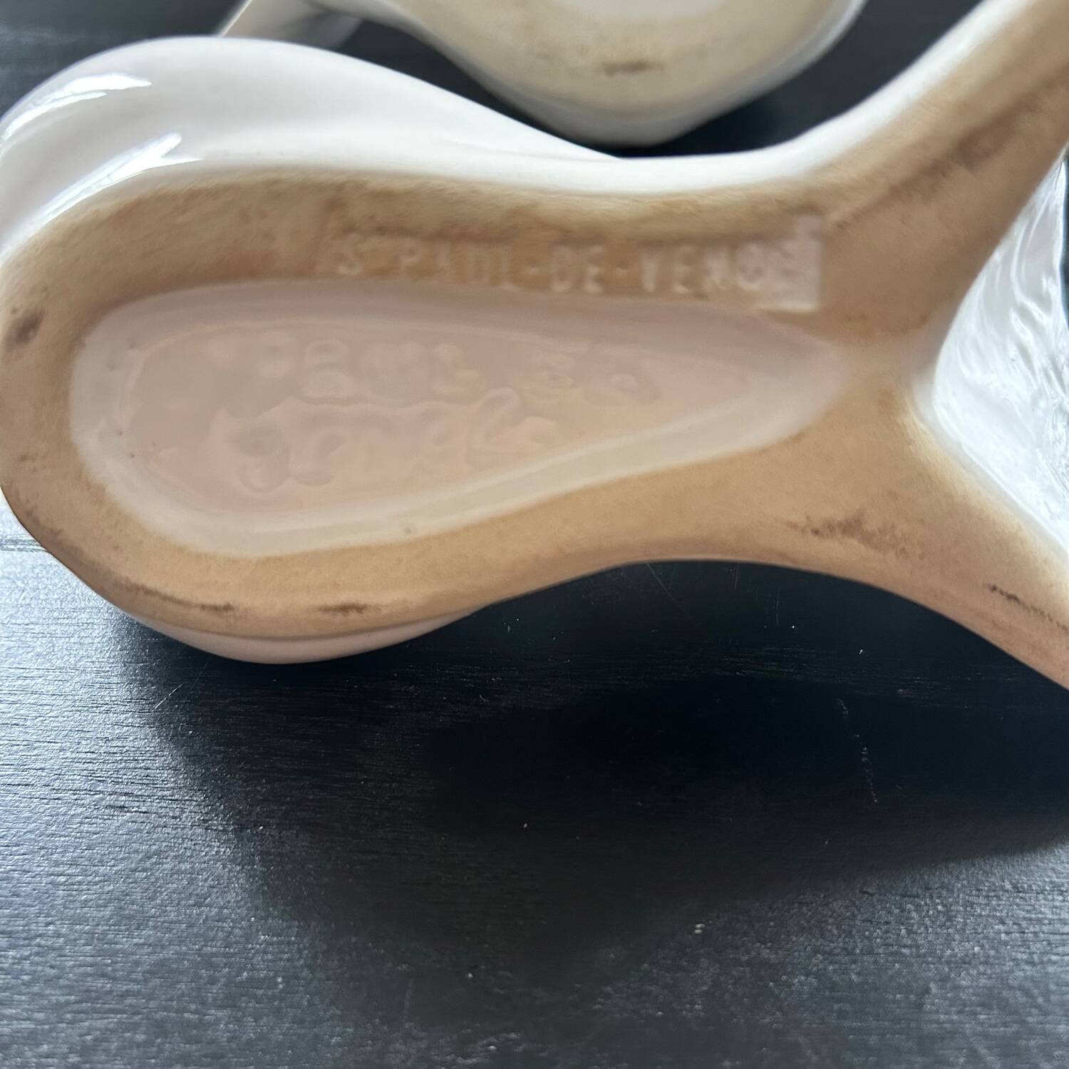 Duo of doves pecking flowers