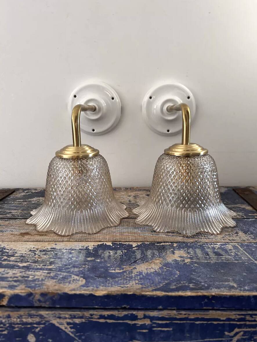 Pair of gold wall sconces
