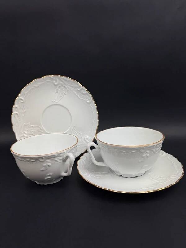 Tharaud Limoges white porcelain cups and saucers with gold relief