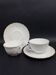 Tharaud Limoges white porcelain cups and saucers with gold relief