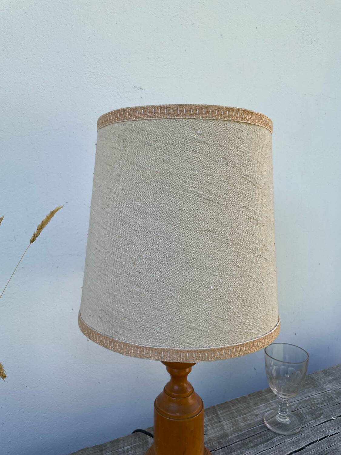 Old turned wooden lamp