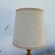 Old turned wooden lamp