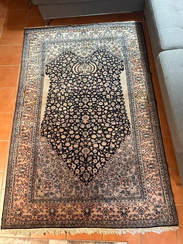 Large blue Persian carpet