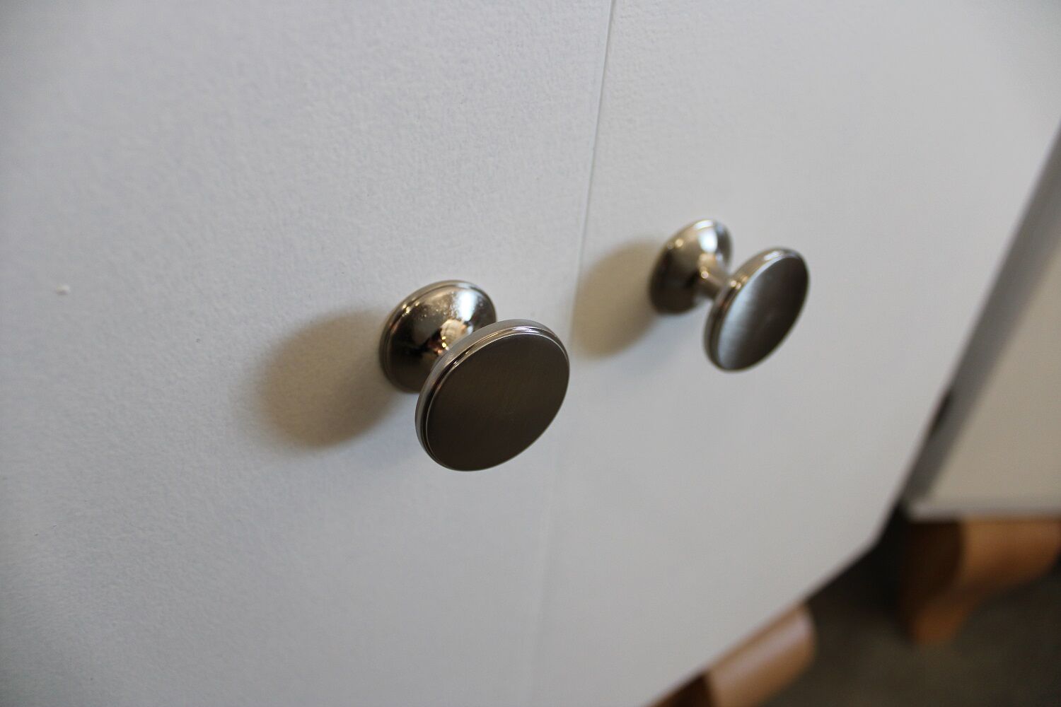 2 white bedside tables