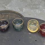 Liqueur carafe, or aperitif, carved with floral decoration in transparent glass and 4 polka dot glasses