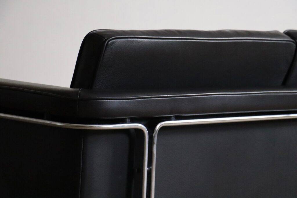Horst Brüning Model 6912 two seater sofa in black leather for Kill International, Germany 1967
