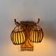 Vintage pair of rattan wall lights, France, 1950.