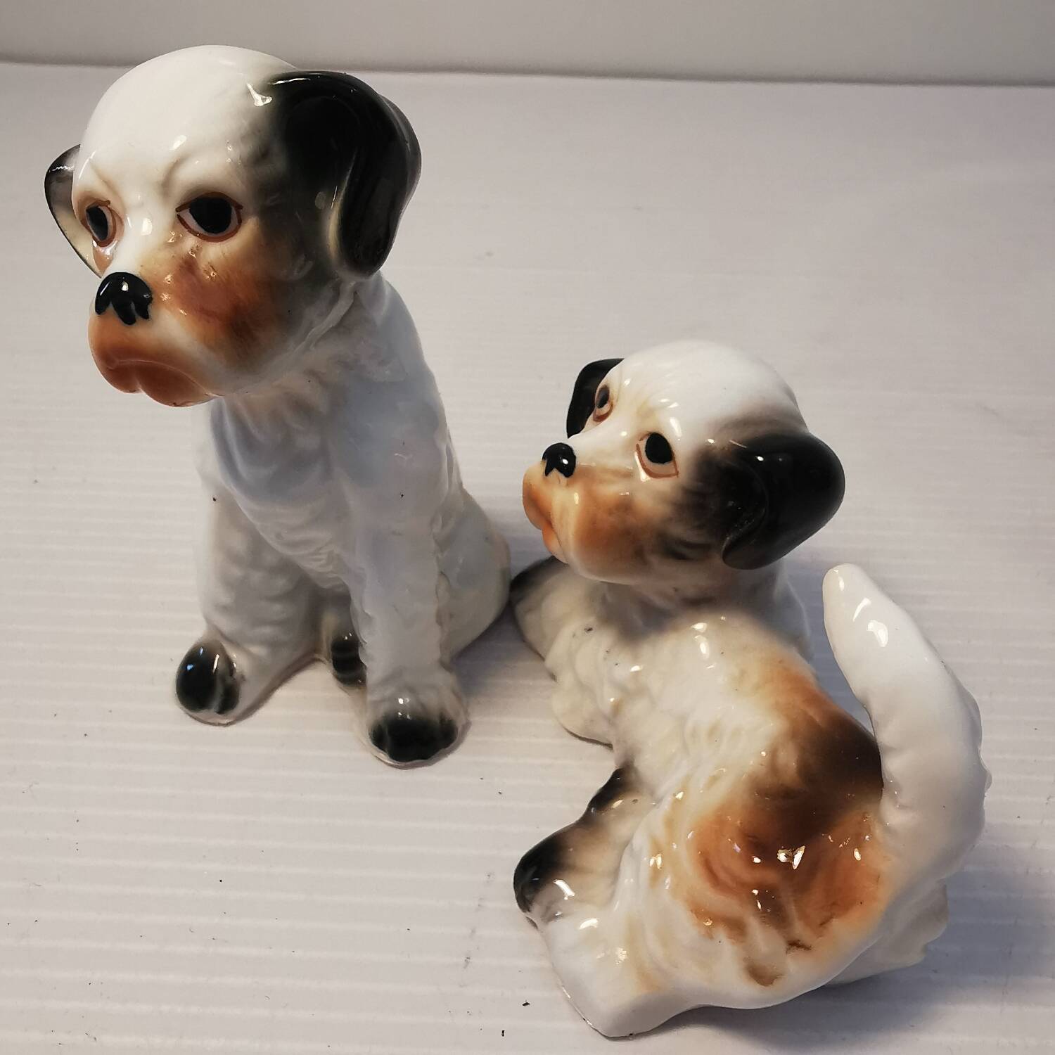 Pair of vintage ceramic terrier puppy dog figurines
