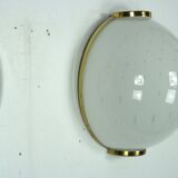 Pair of large round murano bullicante glass sconces with brass. Italy 1970s