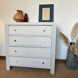 Restored wooden art deco chest of drawers with gilded handles