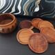 Wooden coasters with vintage holders