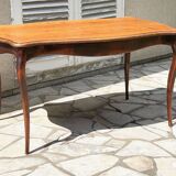 Solid wood table with curved legs