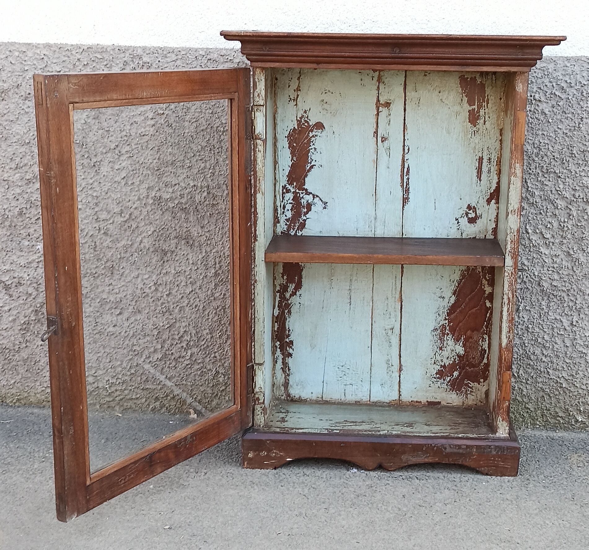 Old wardrobe with glass door