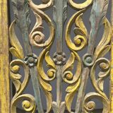 Rectangular Indonesian construction element with blue and yellow plant in carved wood