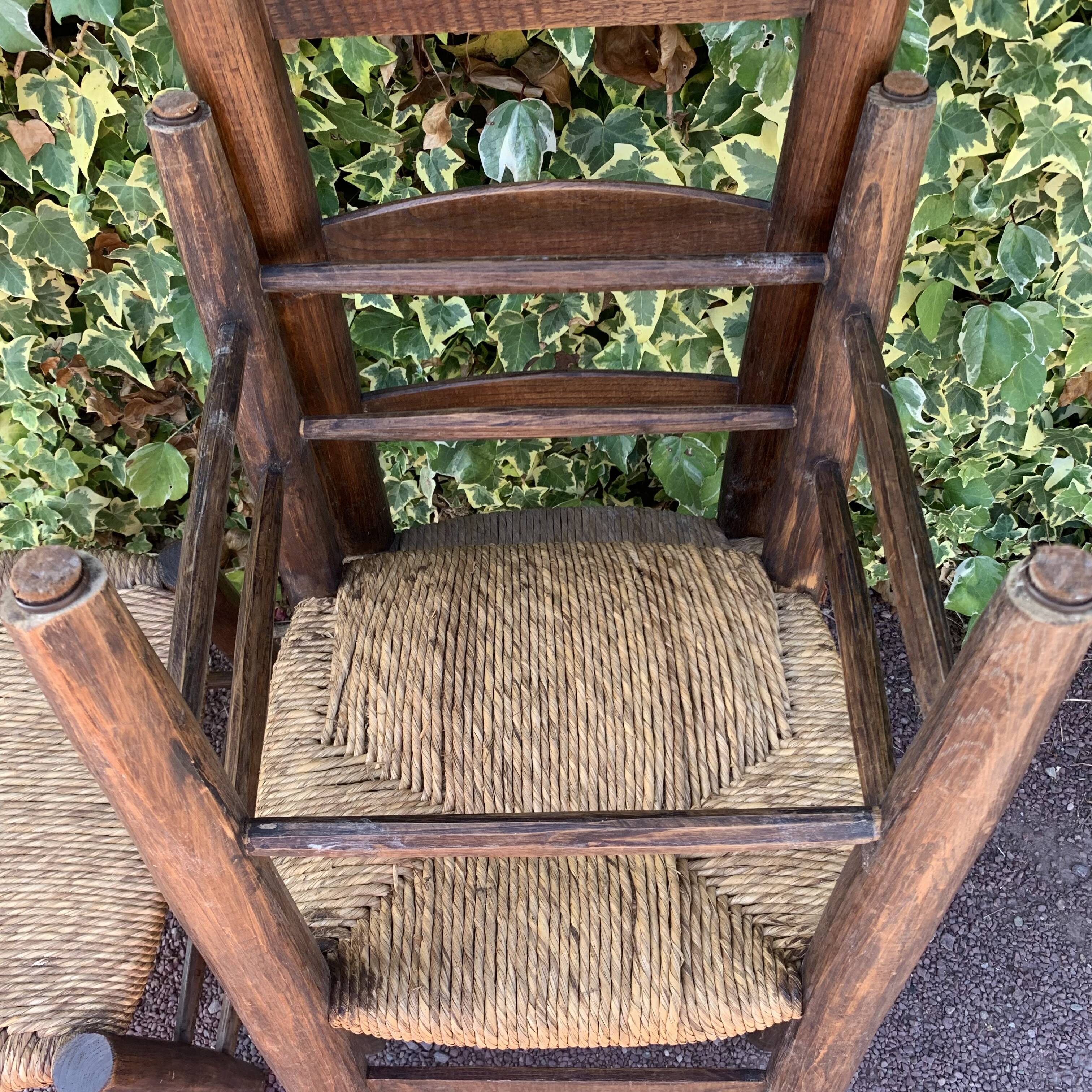 Set of 4 handcrafted rush chairs in solid oak.