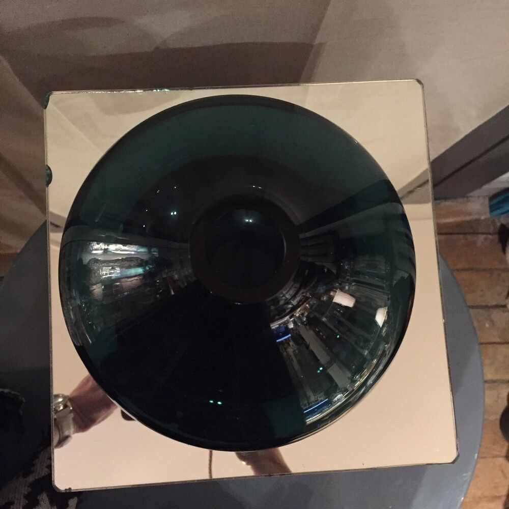 Onion shaped vase of green and blue color in glass