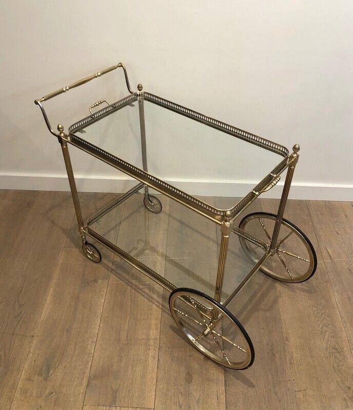Neoclassical style rolling table in silvered brass