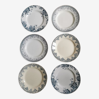 Assiettes plates dépareillées en terre de fer