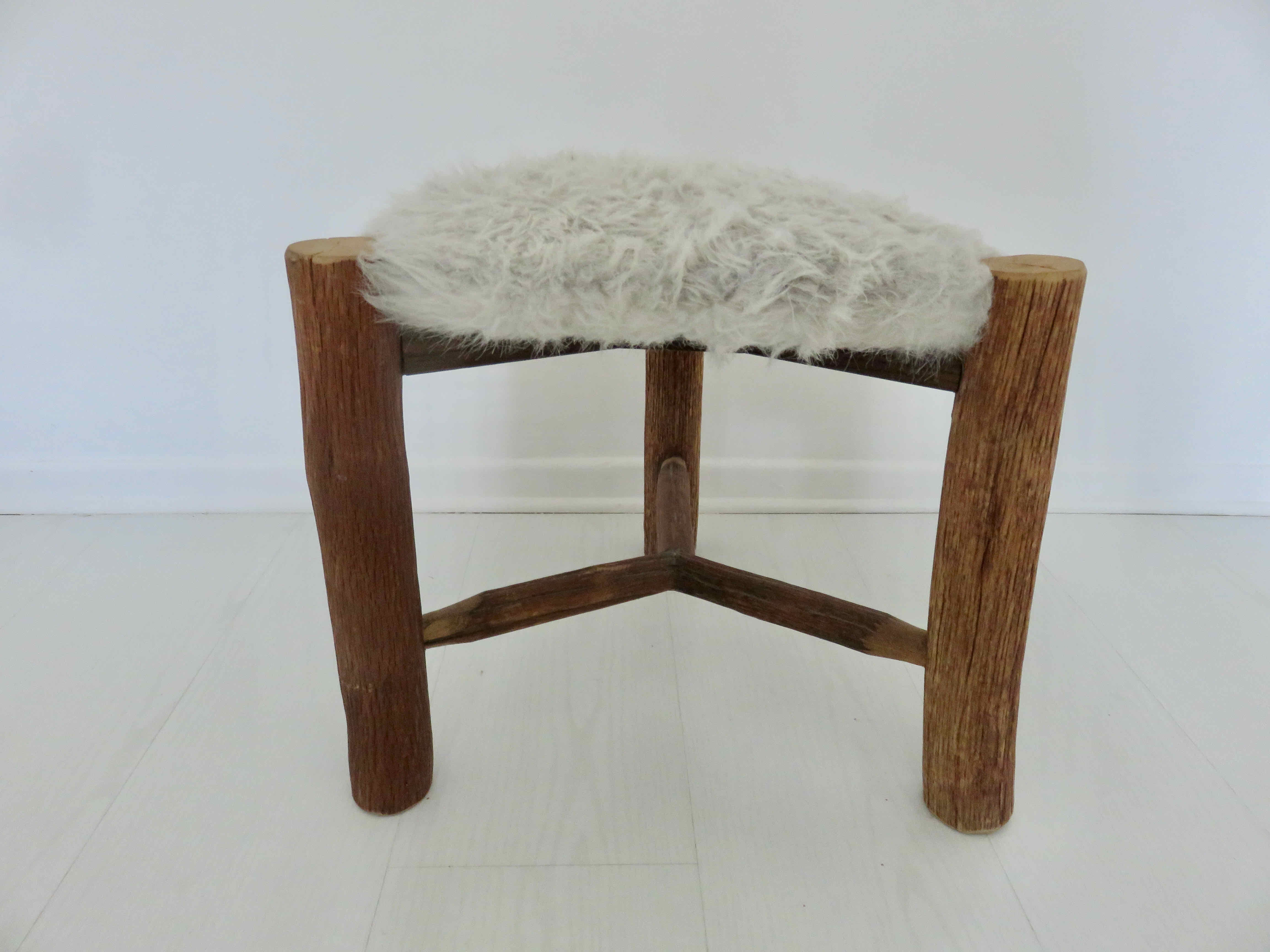 Scandinavian stool "mountain chalet" tripod wood, seat in vintage moumoute