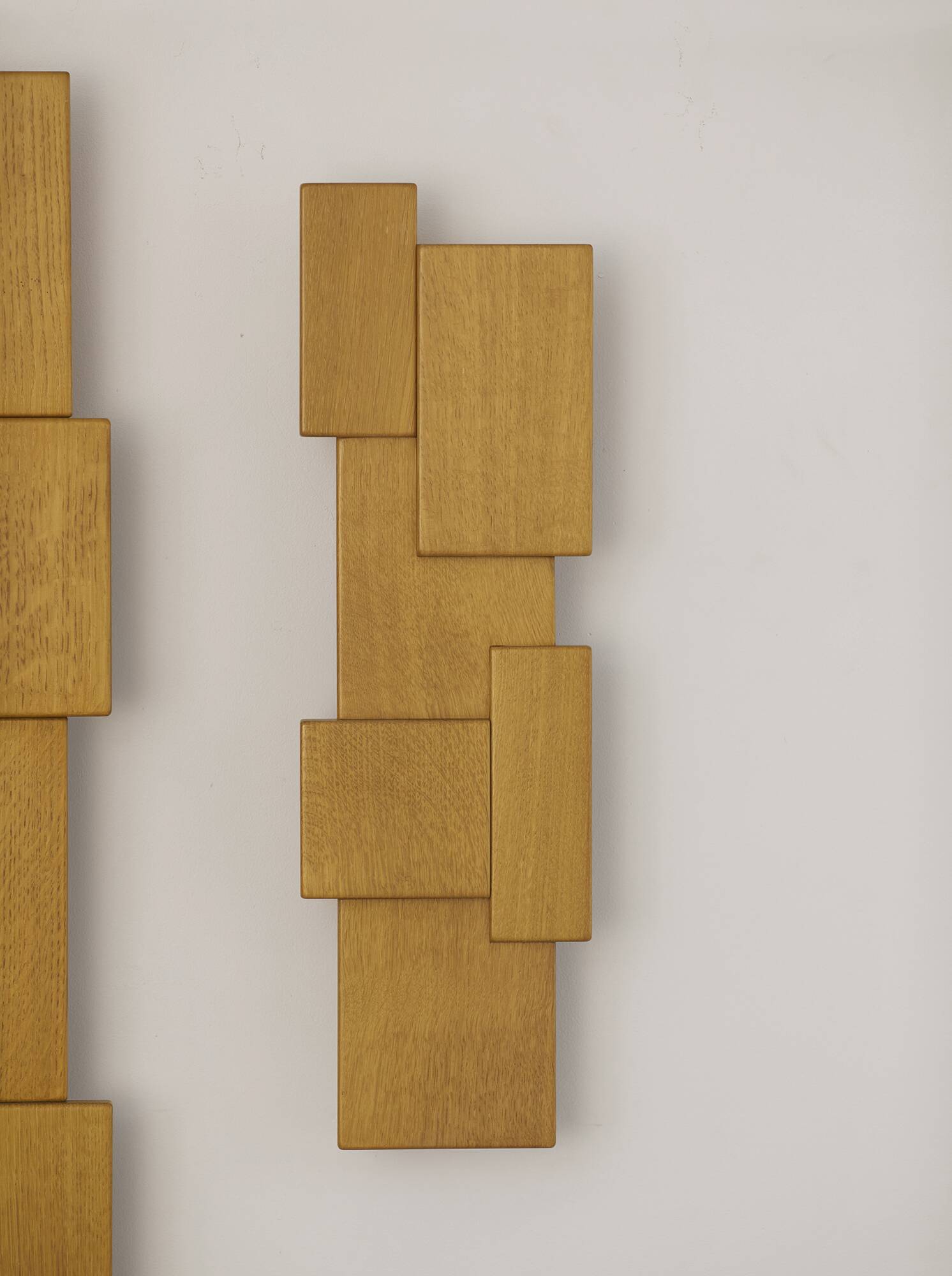 Pair of handcrafted modernist solid oak wall lights, circa 1980