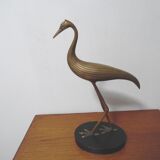 Brass heron standing