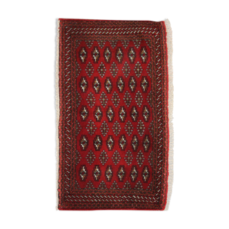 Tapis persan tissé à la main en laine rouge turkmène 60x130cm
