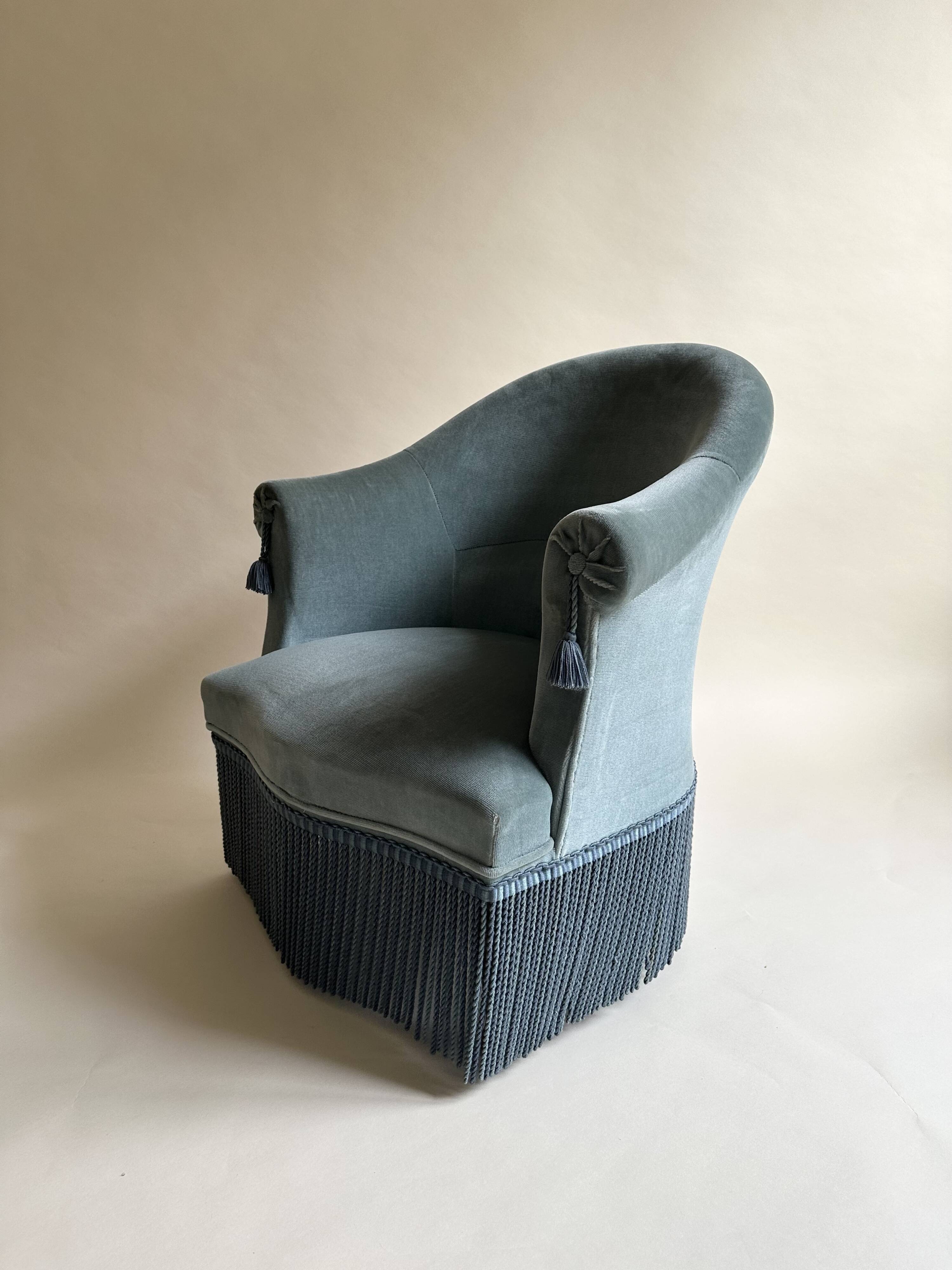 Blue velvet frog armchairs