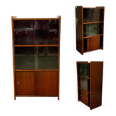 Small English oak library from the 1960s with sliding doors.