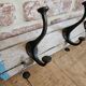 Solid teak coat hook with 4 double cast iron hooks