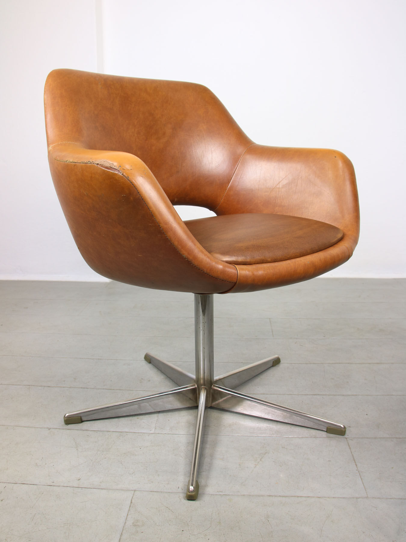 Mid-century brown leatherette swivel chair from Stol