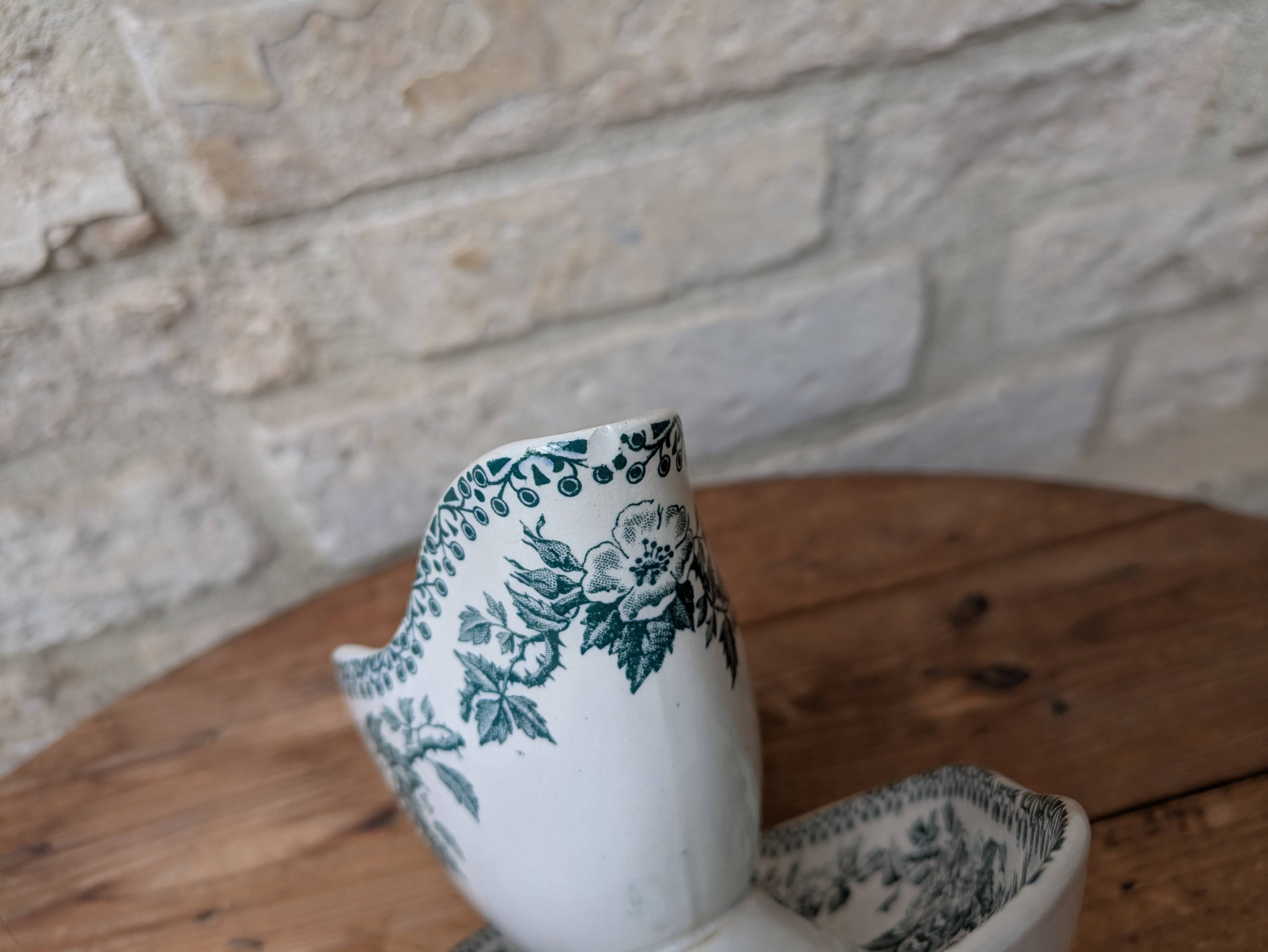 Old sauce boat on fixed frame Guadeloupe Saint Amand ceramic model