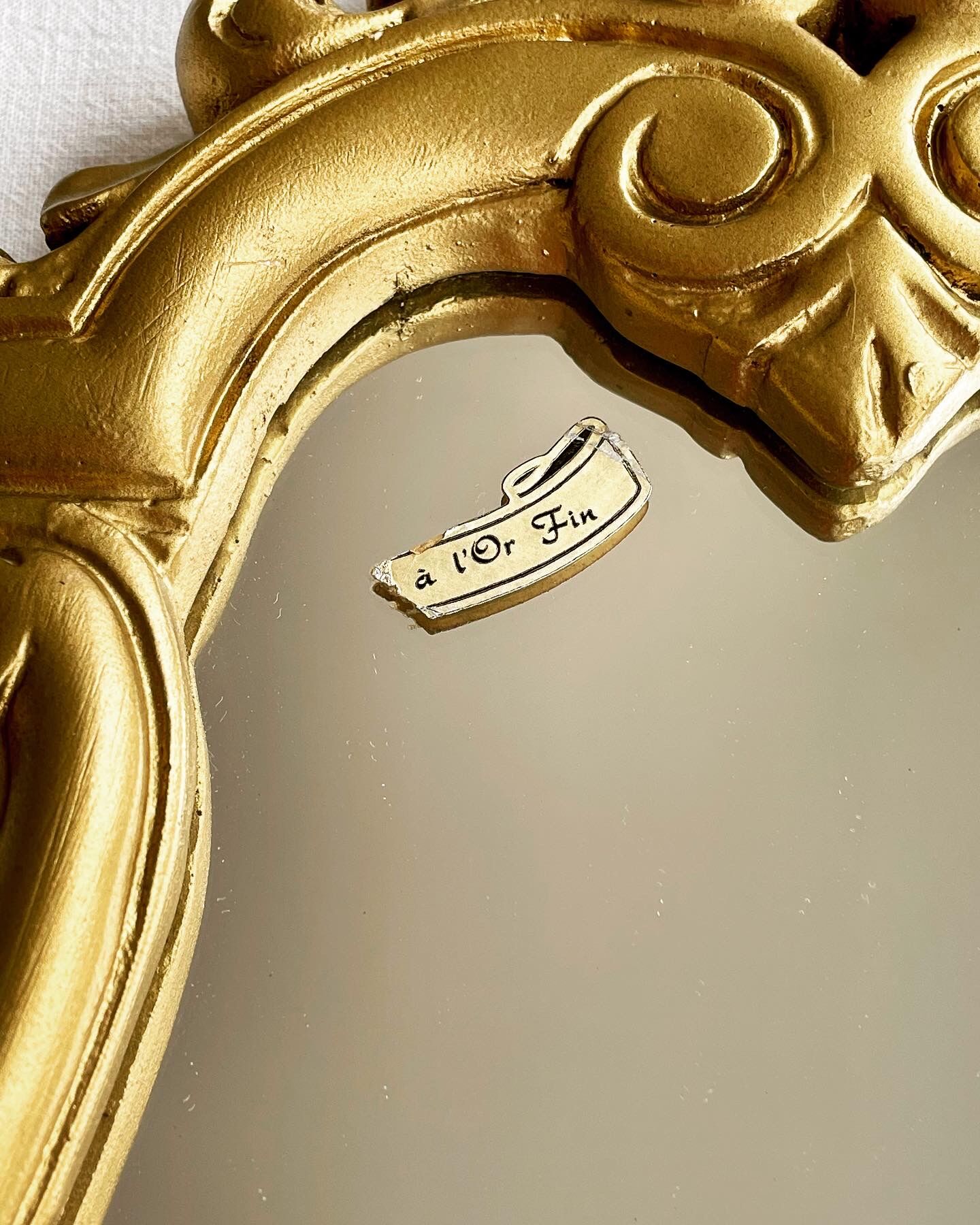 Baroque mirror in golden resin 26x49cm