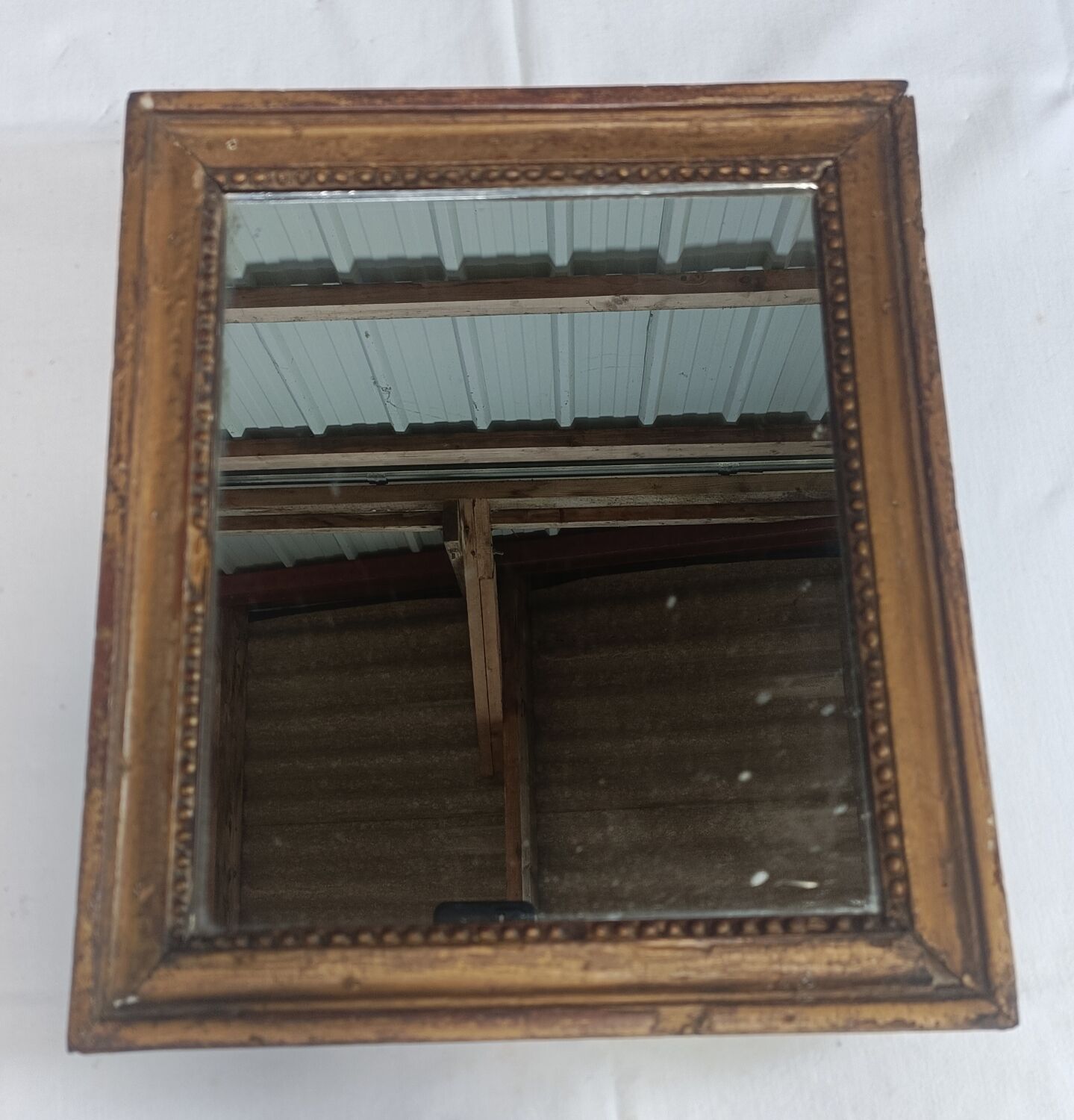 Small mirror in carved stucco wood, nineteenth, original ice