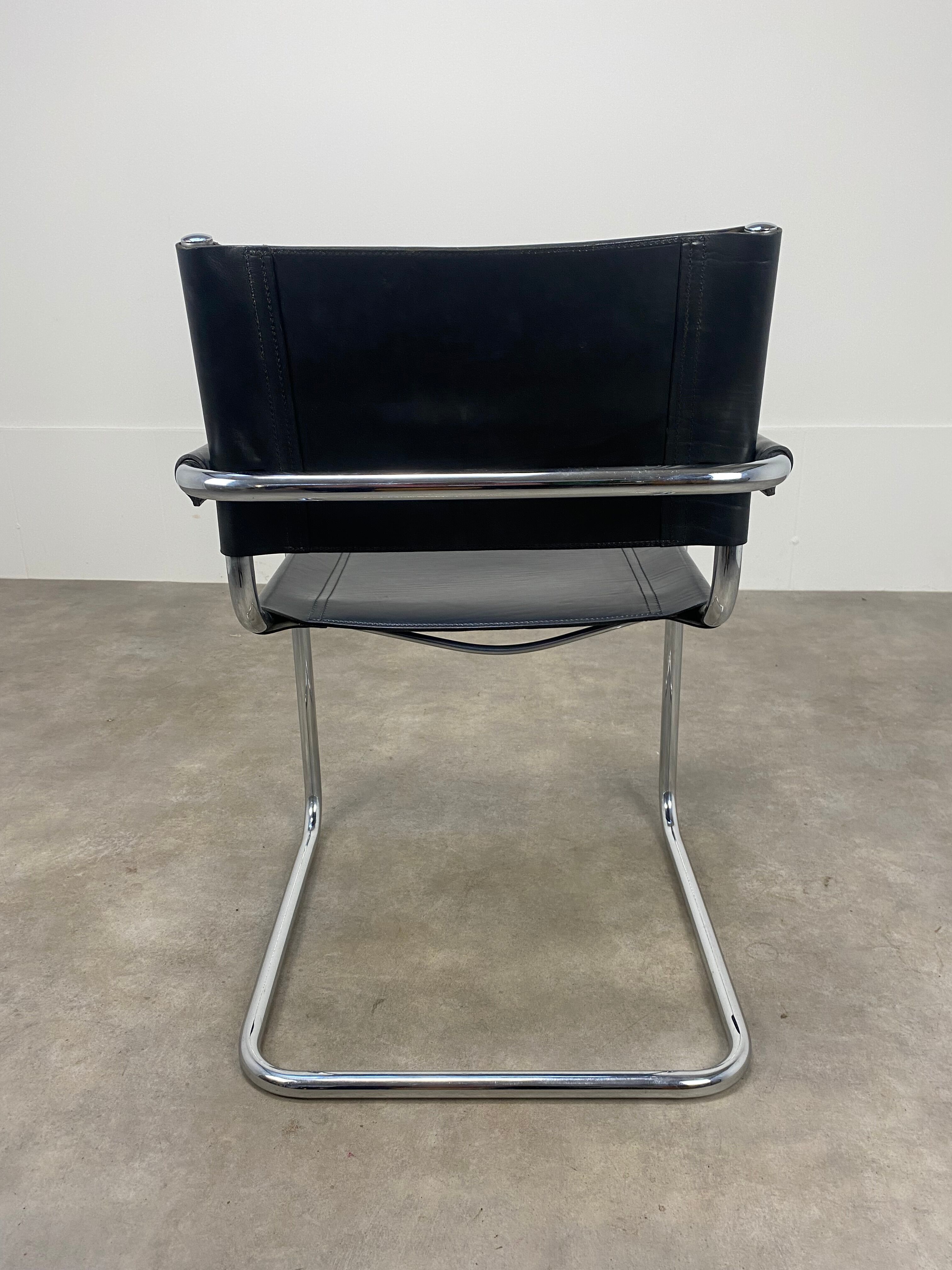 Black and chrome leather cantilever armchair