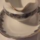 Sauceboat on a base Art Deco porcelain from Châteauroux by Gaston Sailly.