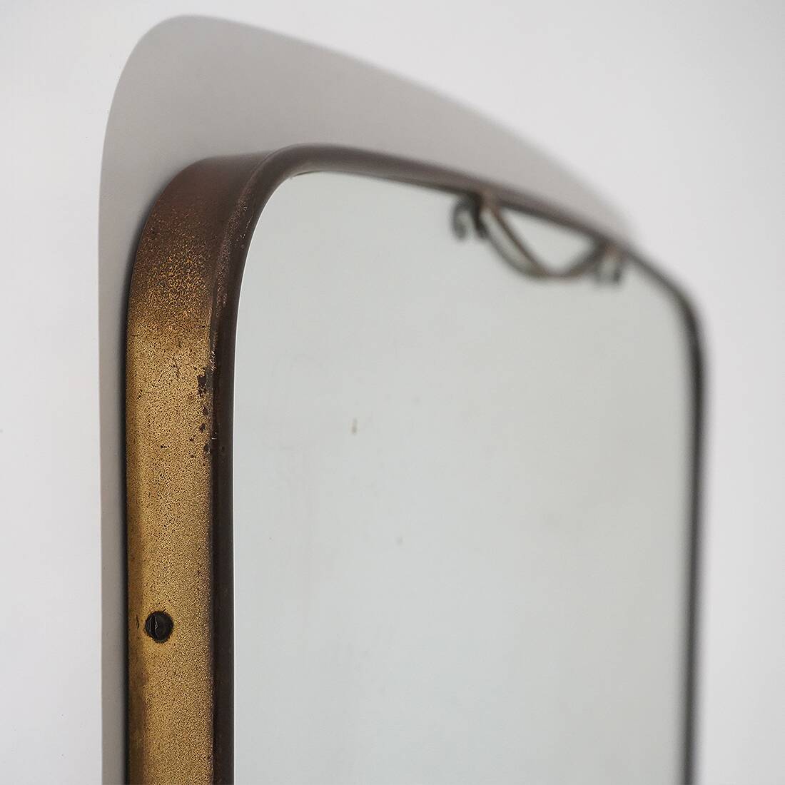 Wall mirror with brass frame, 1950s