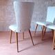 4 vintage Baumann Essor chairs in wood and skai from the 1960s.