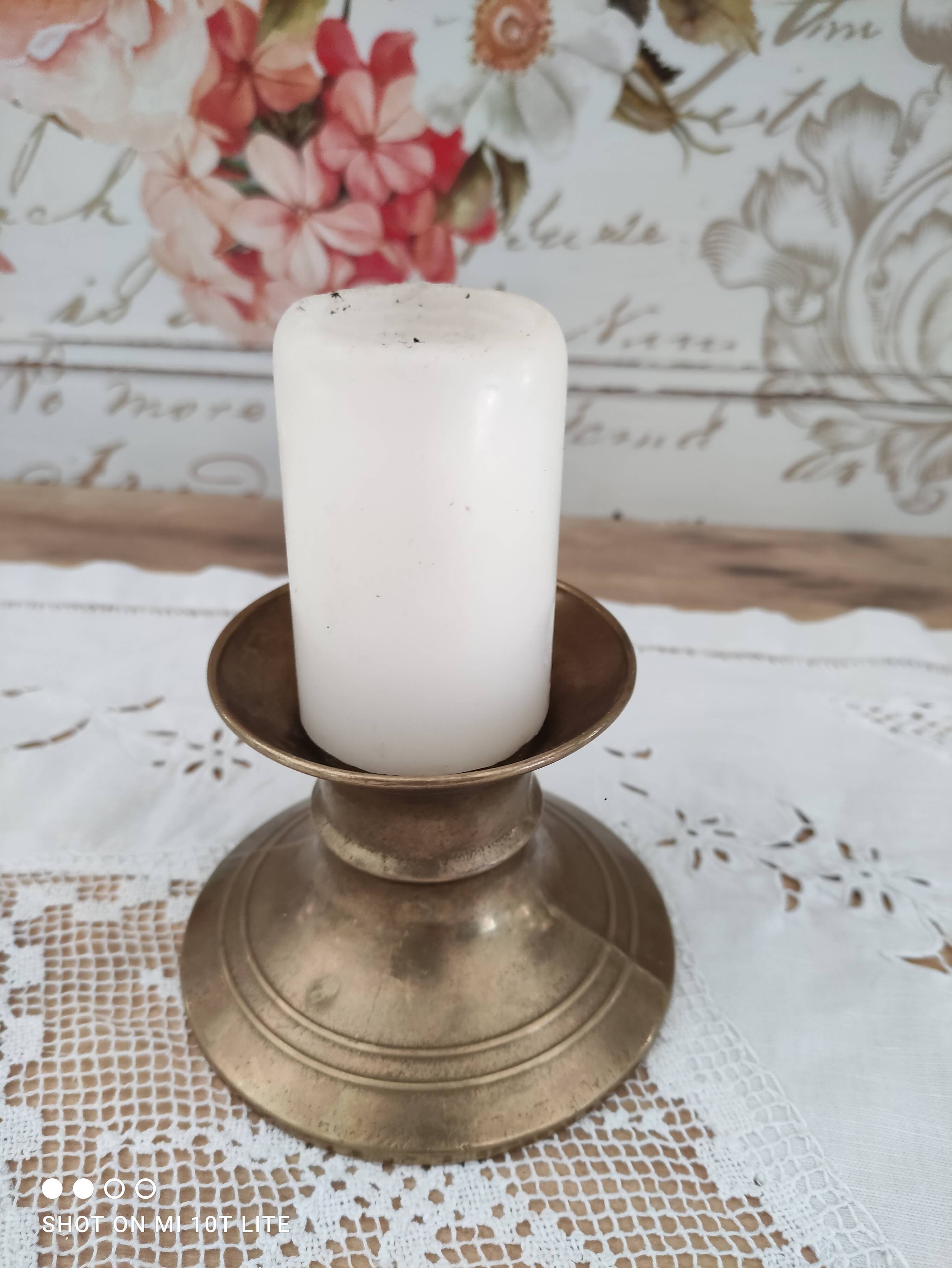 Low brass candle holder