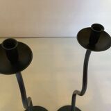 Pair of black hysteria-style candlesticks