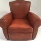 Large club chair in cognac leather