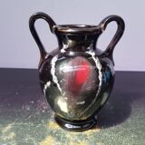 Old vase with coves ceramic black