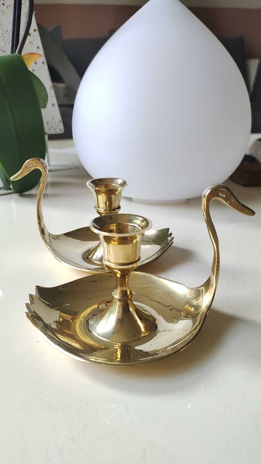 Pair of hand candle holders/Cellar rats shape swans, in polished brass. 1950s