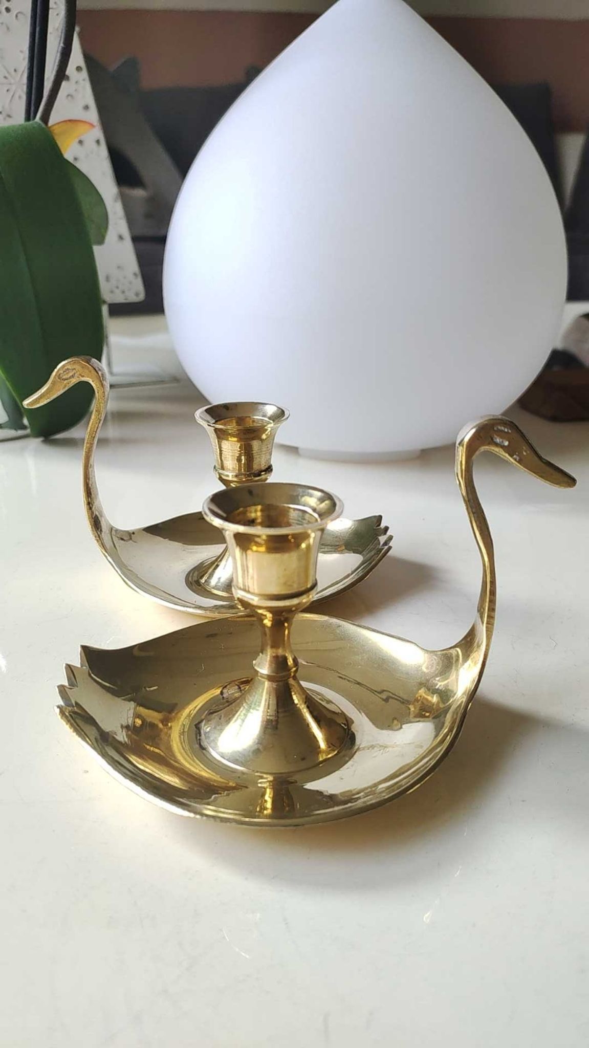 Pair of hand candle holders/Cellar rats shape swans, in polished brass. 1950s