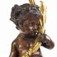Antique candelabrum in bronze and black marble, Europe, 19th century.