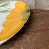 Round serving dish with hand-painted yellow flowers in ceramic TC Italy.