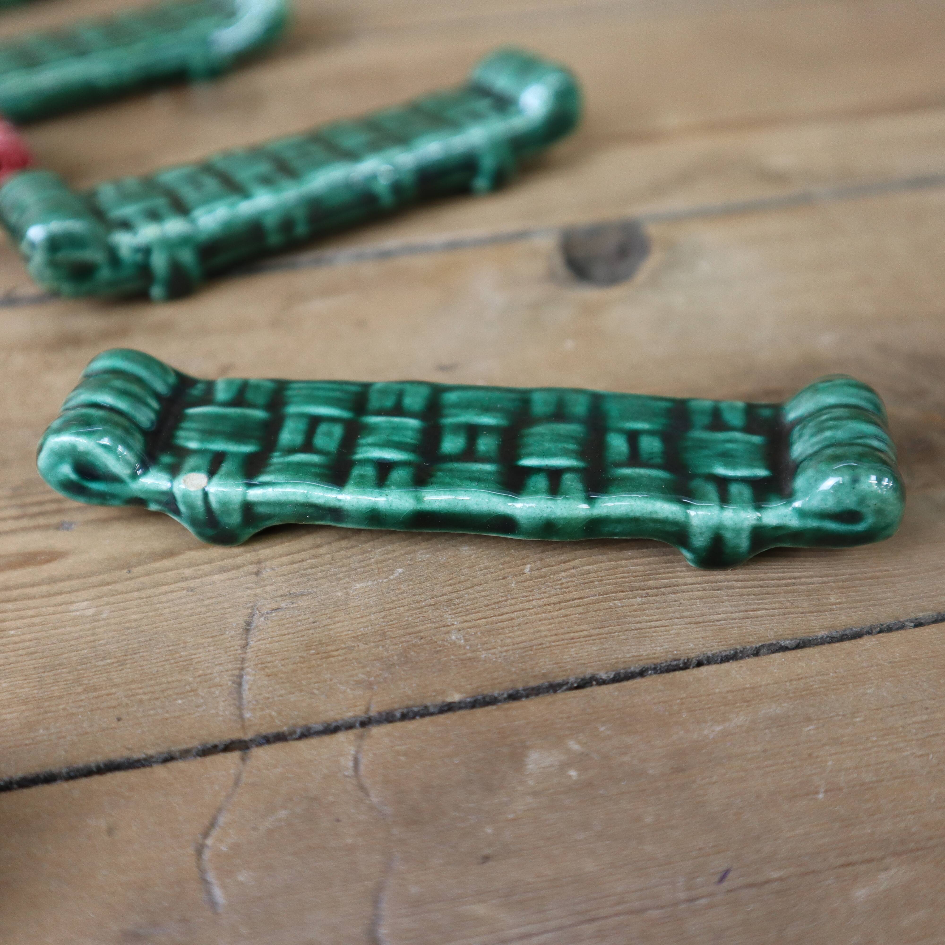 Set of 8 lonchamp france knife holders in barbotine