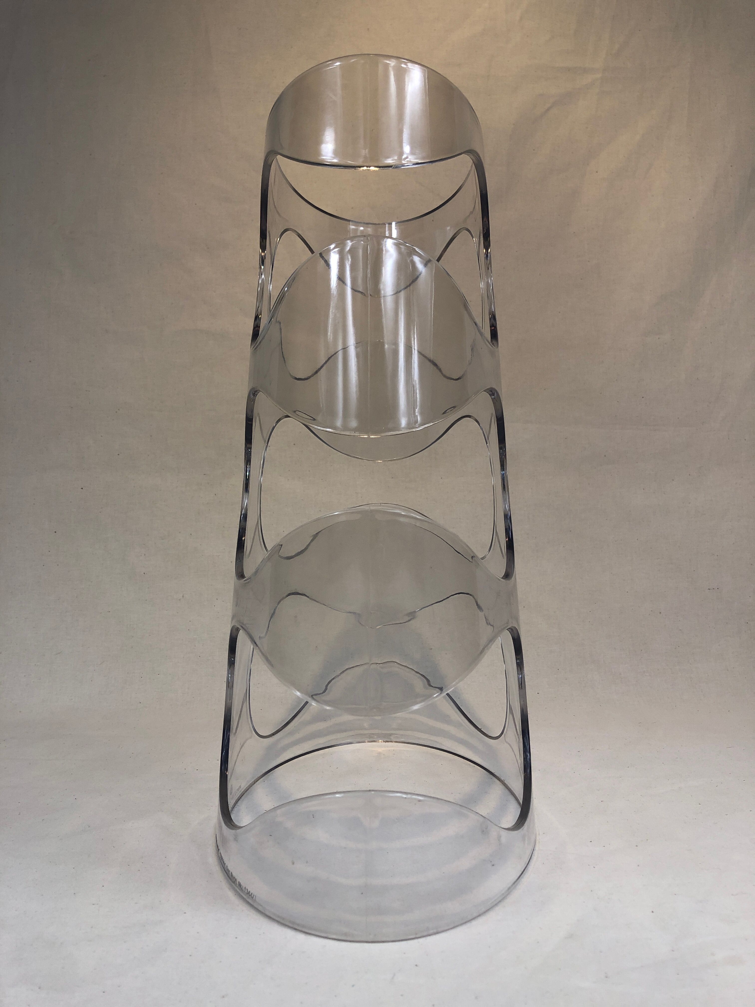 Transparent plexiglass bottle holder Umbra design Ran Lerner