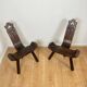 Pair of low tripod chairs in solid wood, mid-20th century.